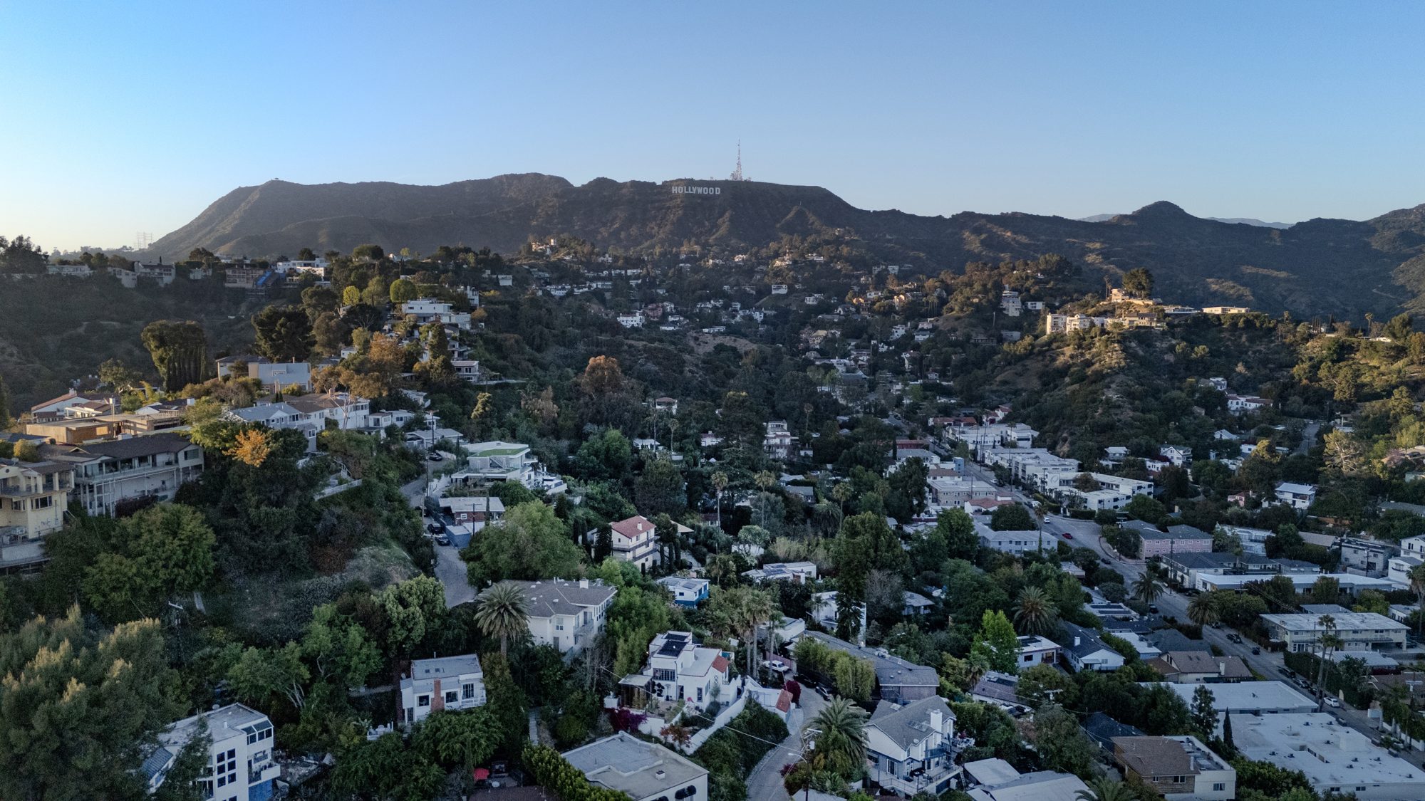 Aerial view looking north from above the house across Beachwood Canyon to the Hollywood Sign on Mount Lee